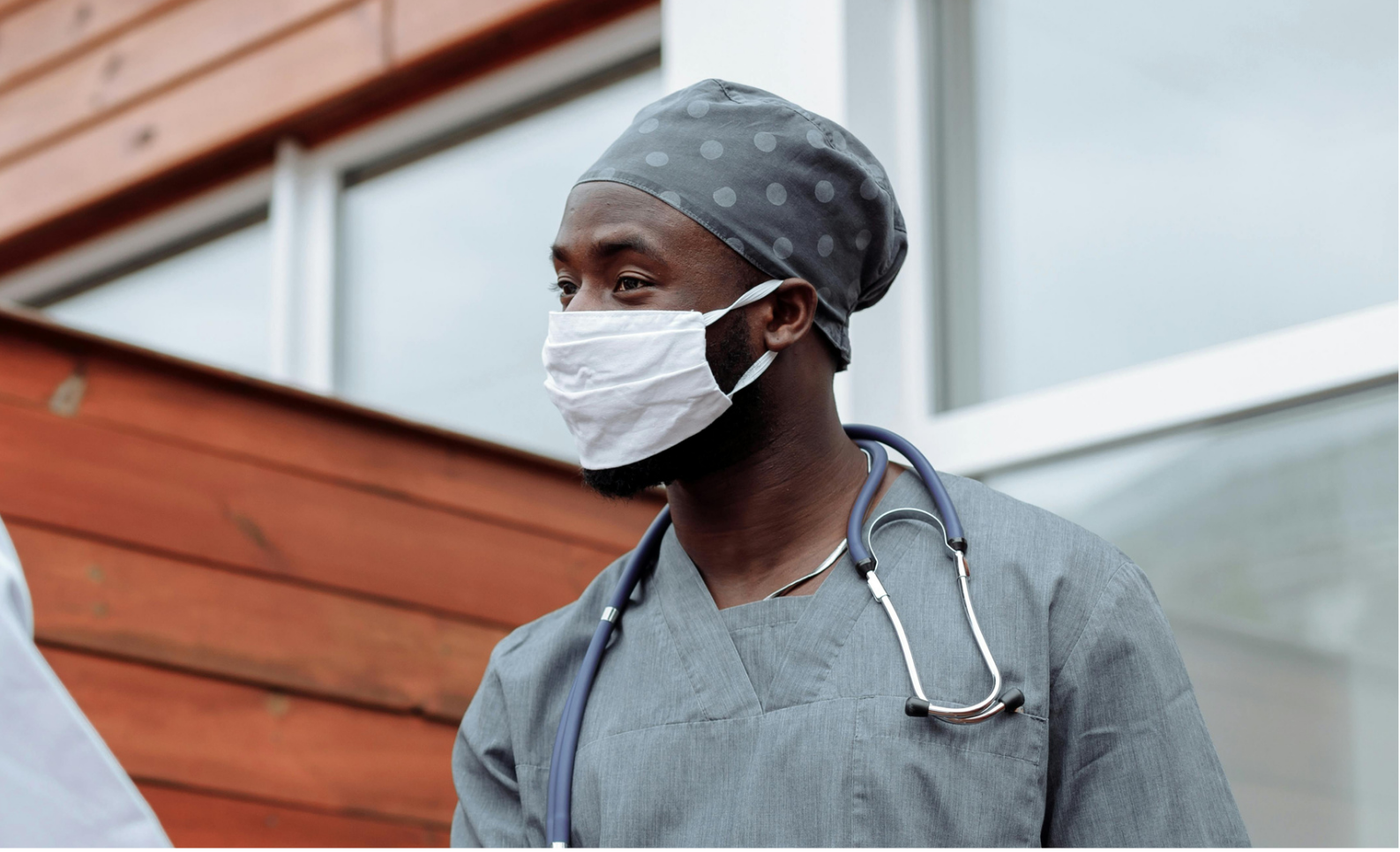 medical black guy wearing a surgical mask